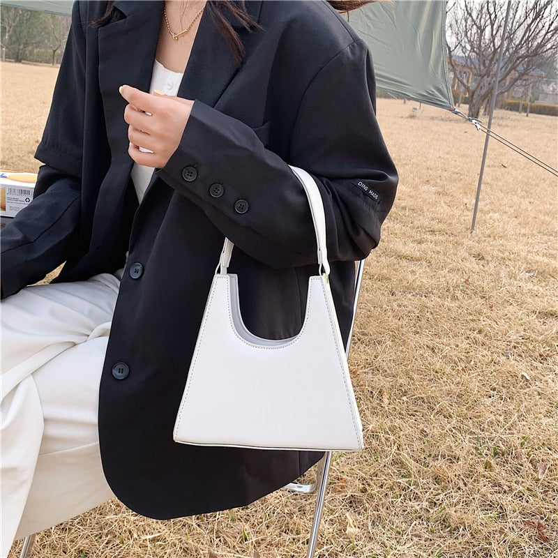 Karlik תיק יד קטן